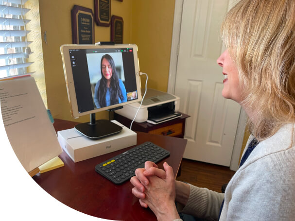 a woman video calling a woman