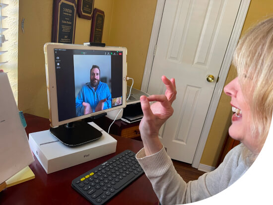 a woman video calling a man