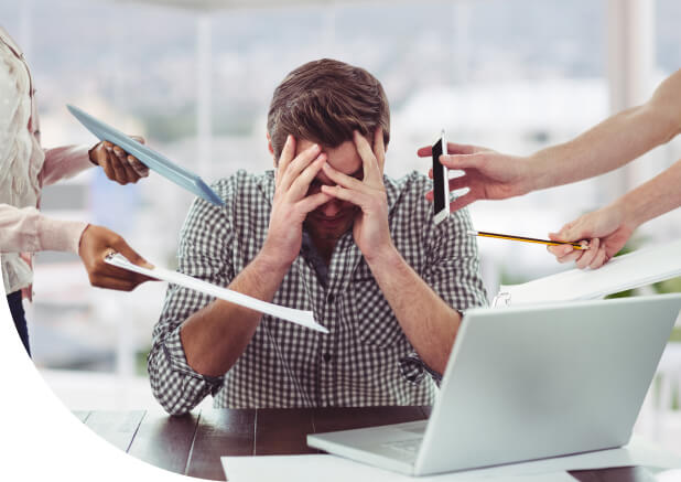 Businessman stressed out at work in casual office