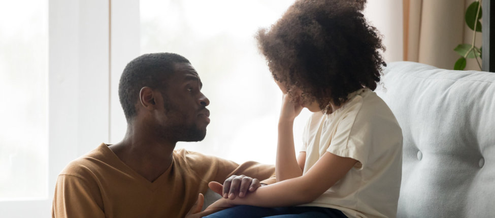 Man comfort the young boy